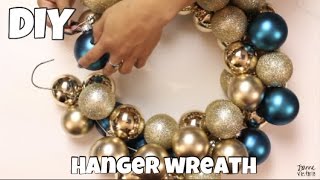 DIY Holiday Hanger Wreath [upl. by Nimajnab]